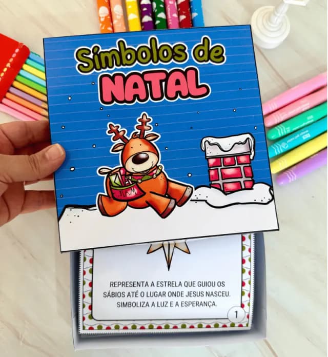 história na caixa simbolos do natal.webp