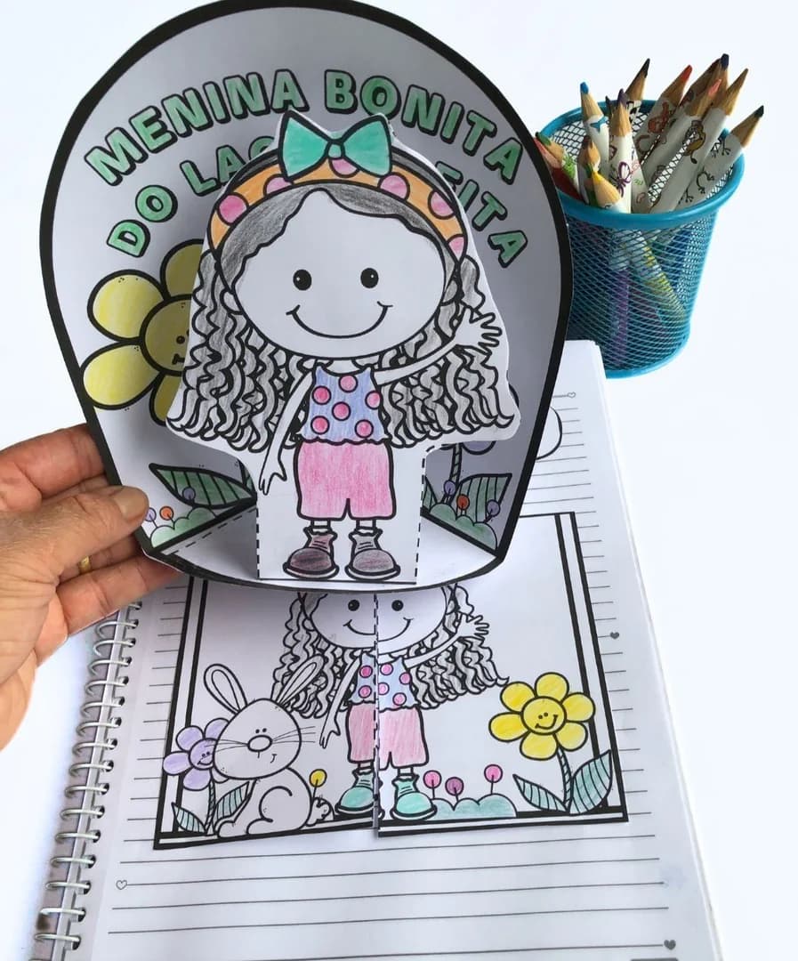 atividade interativa menina bonita do laço de fita.jpg
